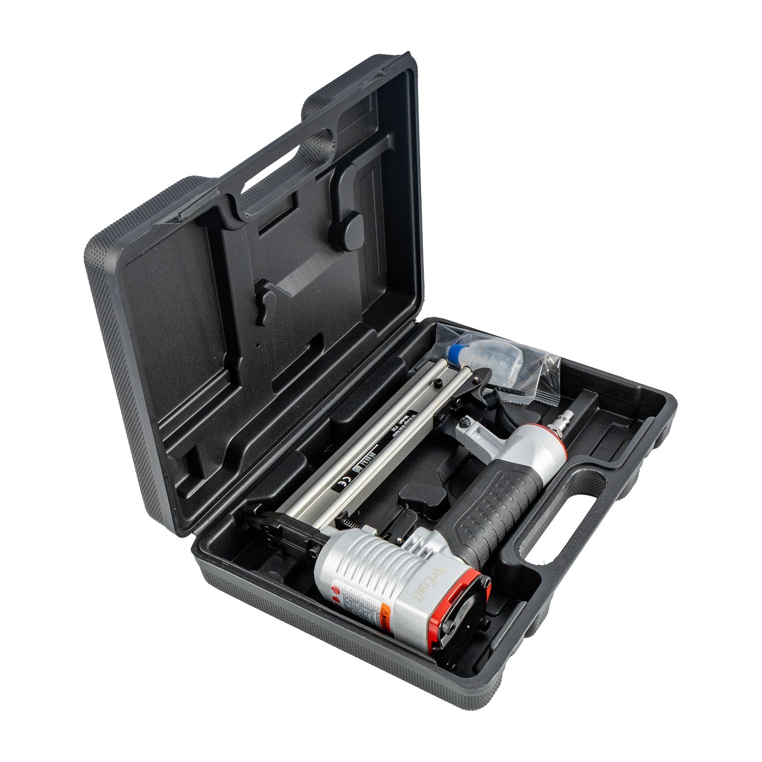 Pneumatic brad nailer with nail strip and fittings in hard carry case