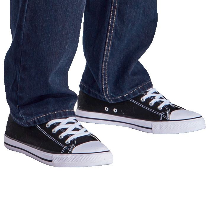 Navy canvas lace-up sneaker on denim pant cuffs, white laces