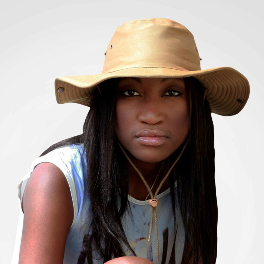 Tan canvas bush hat with wide brim and side eyelets