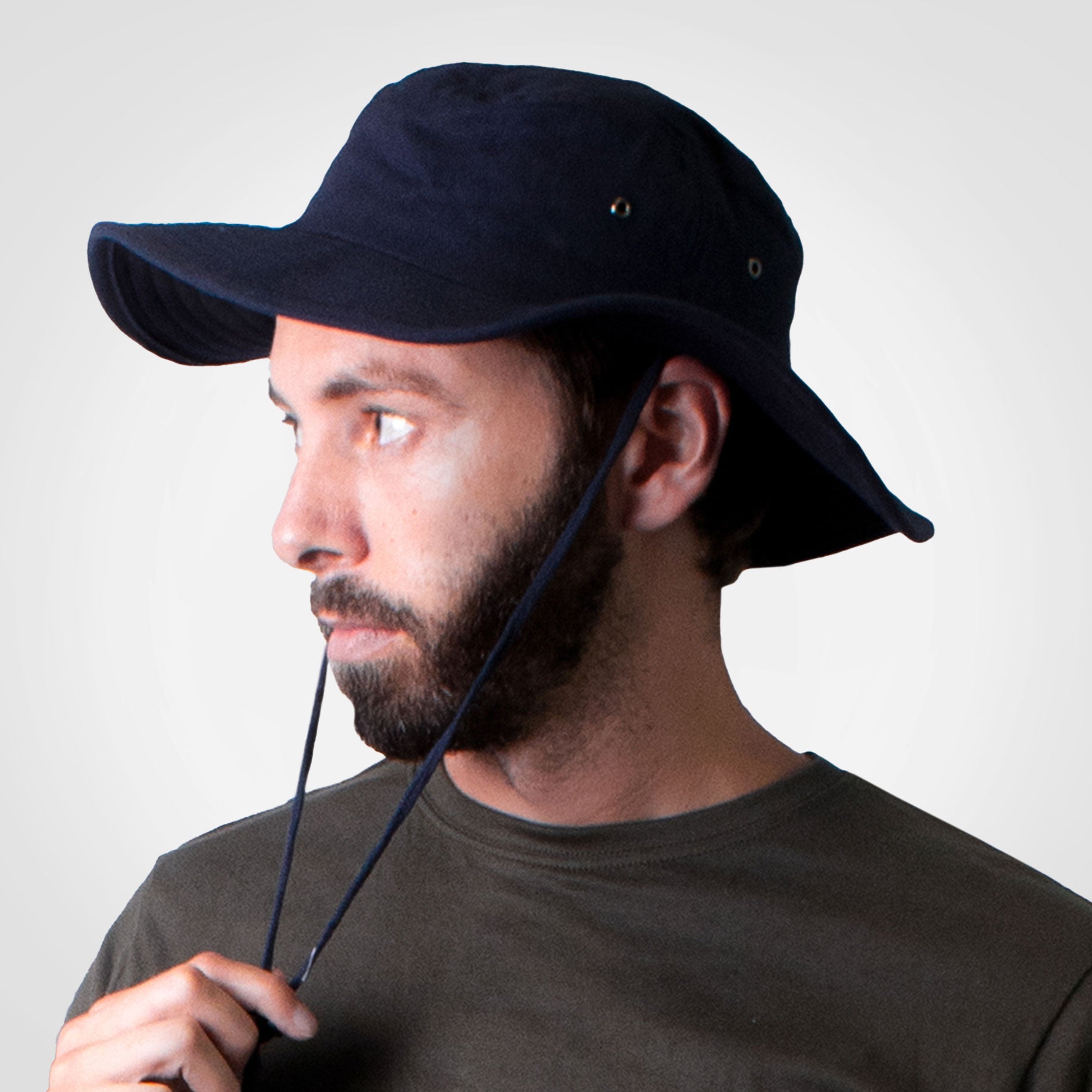 Cricket hat in navy worn with chin tie cord