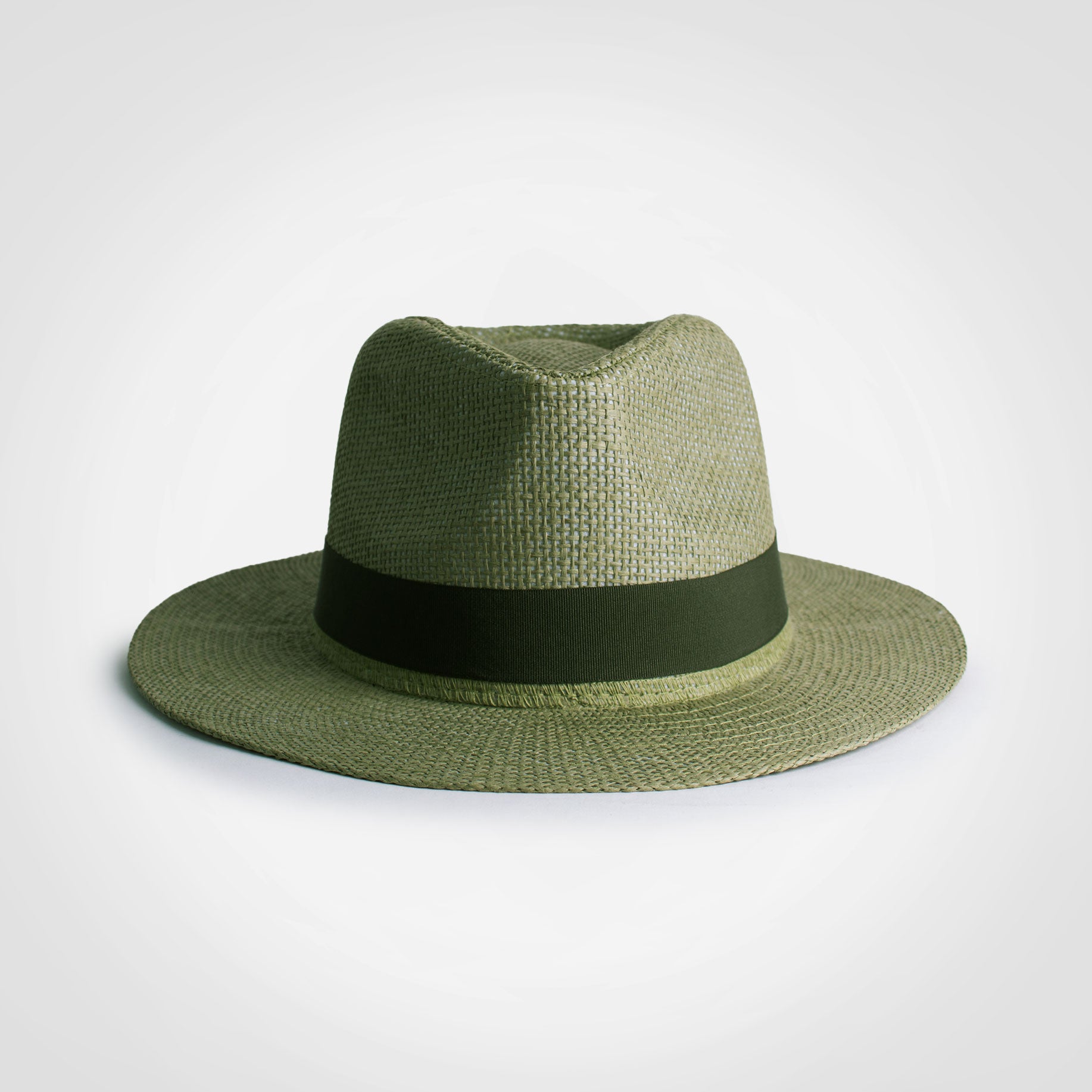 Panama hat, green woven straw with dark band and wide brim
