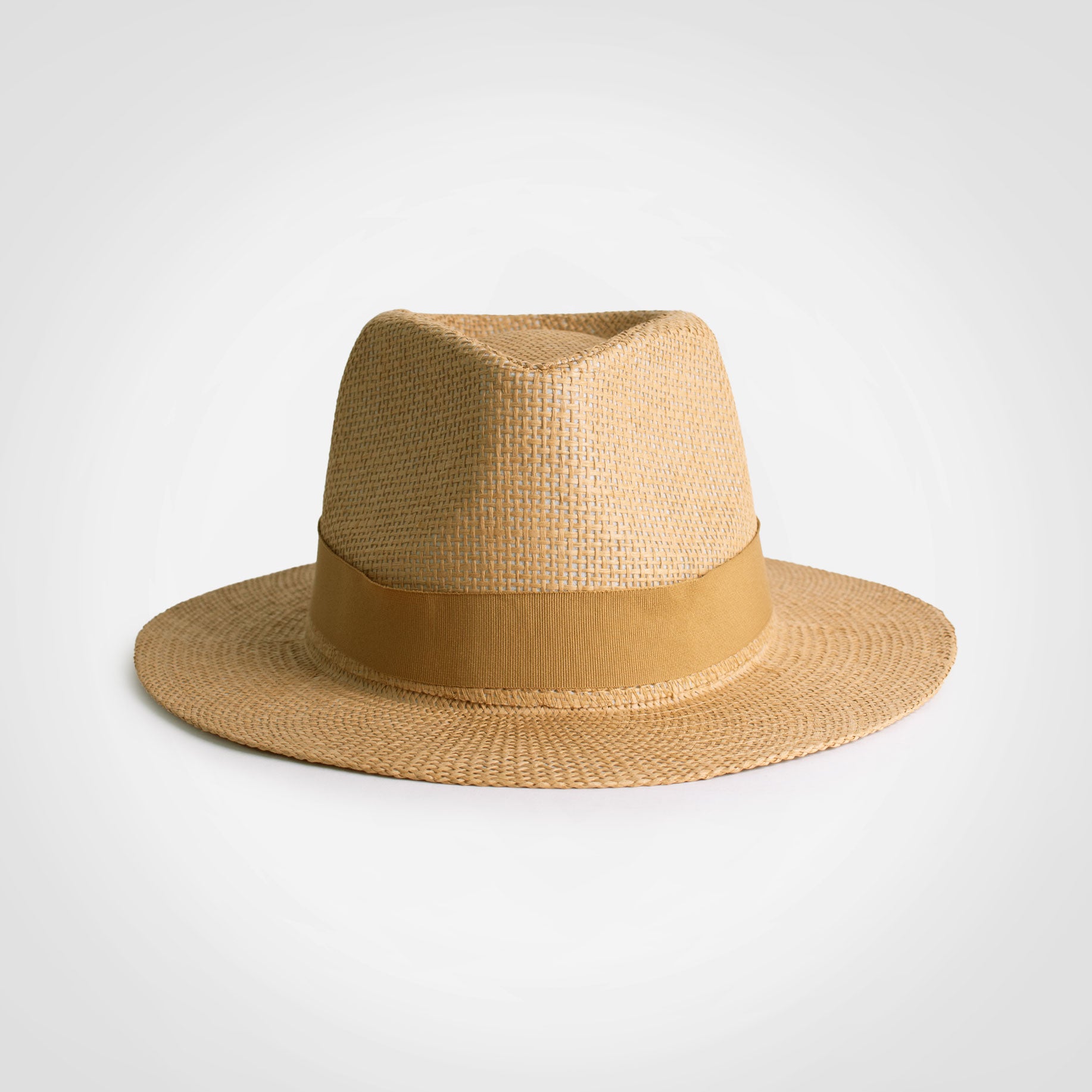 Panama hat, tan woven straw with dark band and wide brim