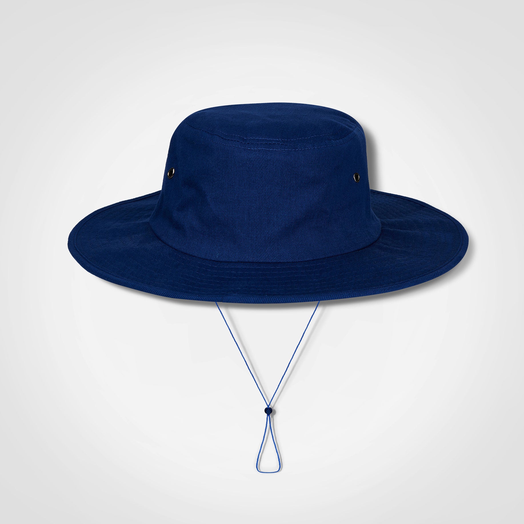 Cricket hat in royal blue with wide brim and chin tie cord