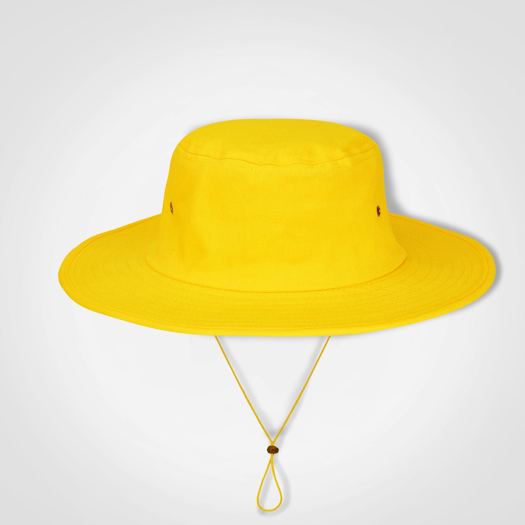 Cricket hat in yellow with wide brim and chin tie cord