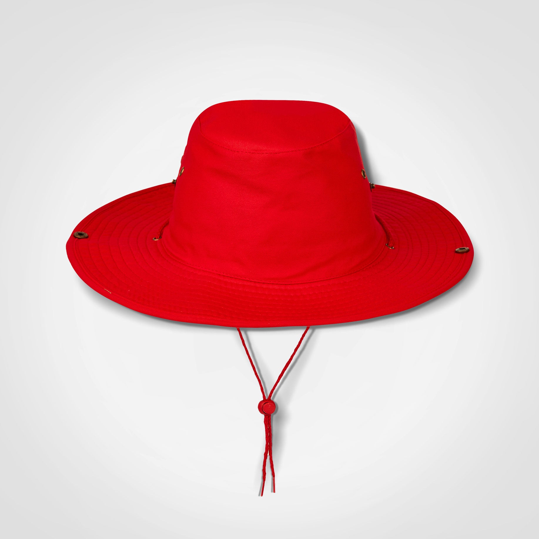 Red bush hat with wide brim and chin strap ties