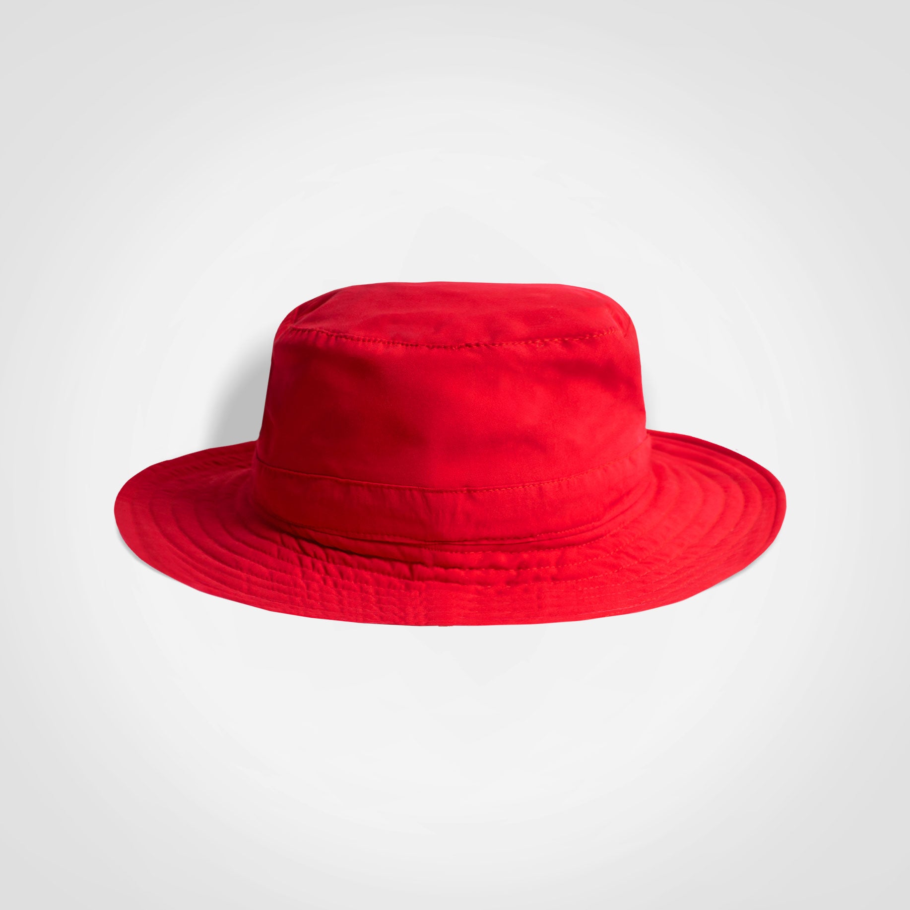 Red kids bucket hat with wide brim and front crown seam