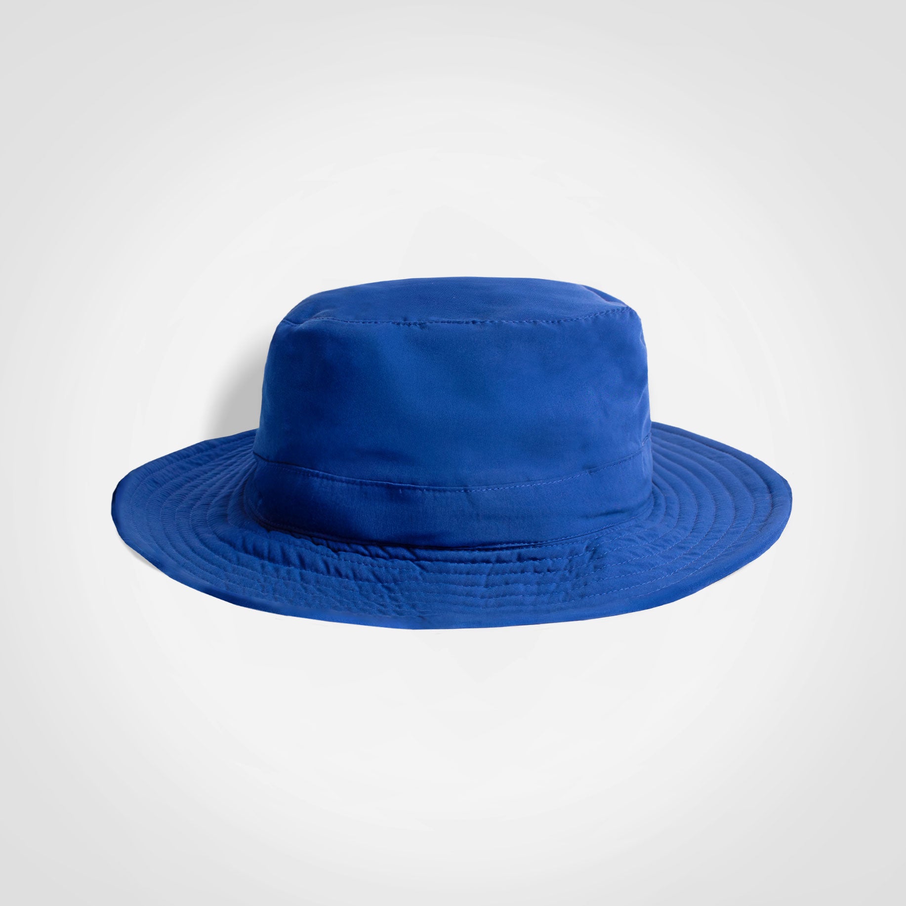 Royal blue kids bucket hat with wide brim and rounded crown