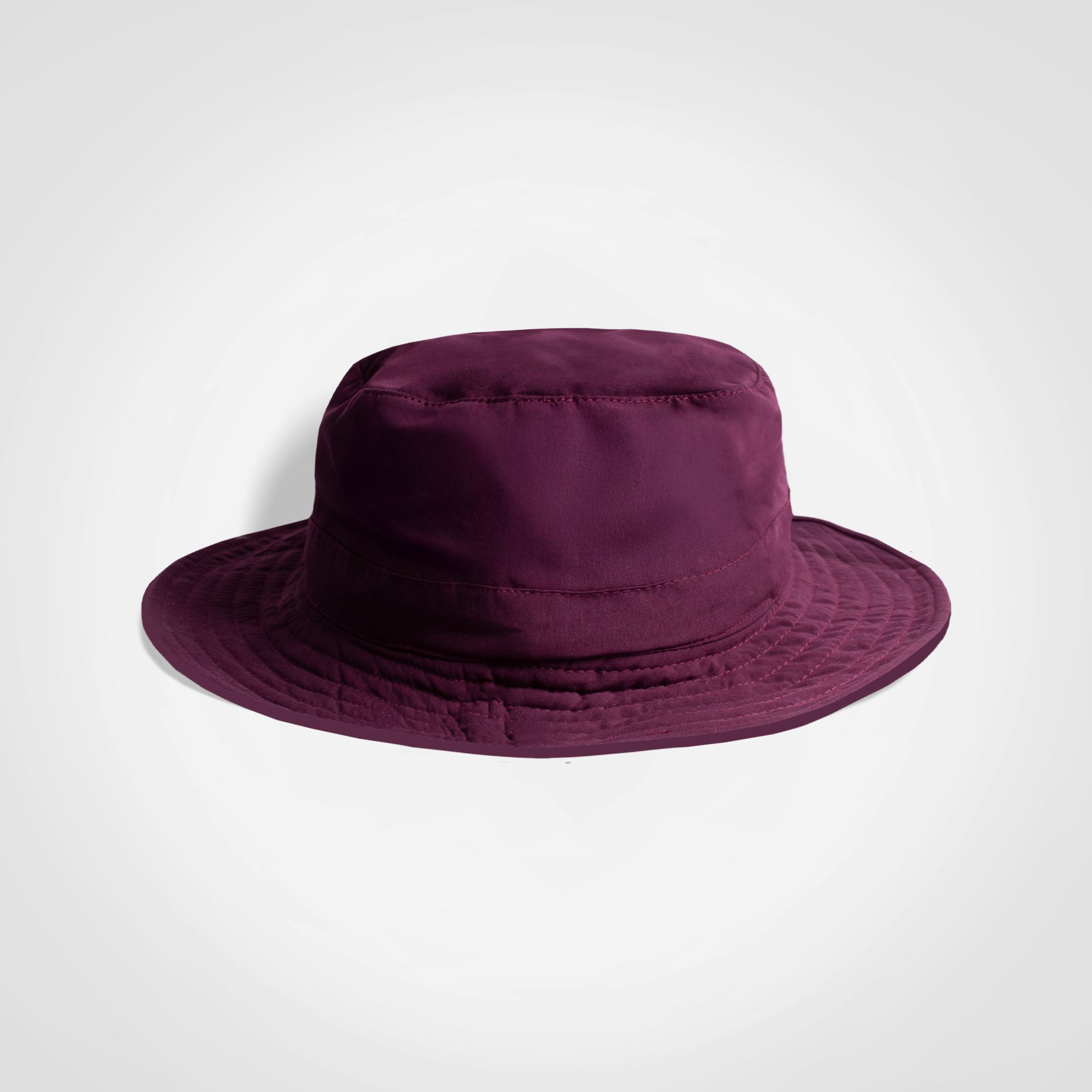 Burgundy kids bucket hat with wide brim and rounded crown