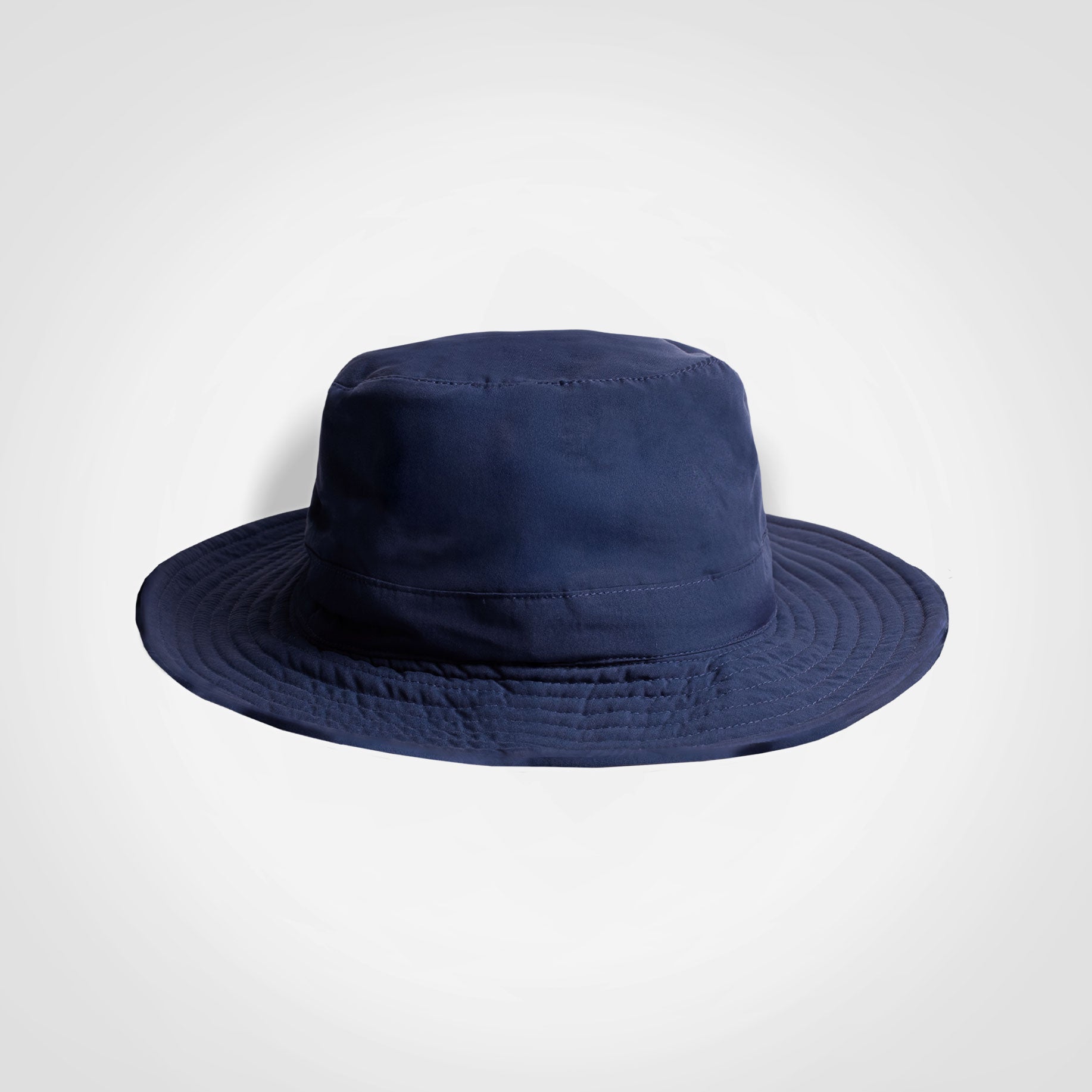 Navy-blue kids bucket hat with wide brim and rounded crown