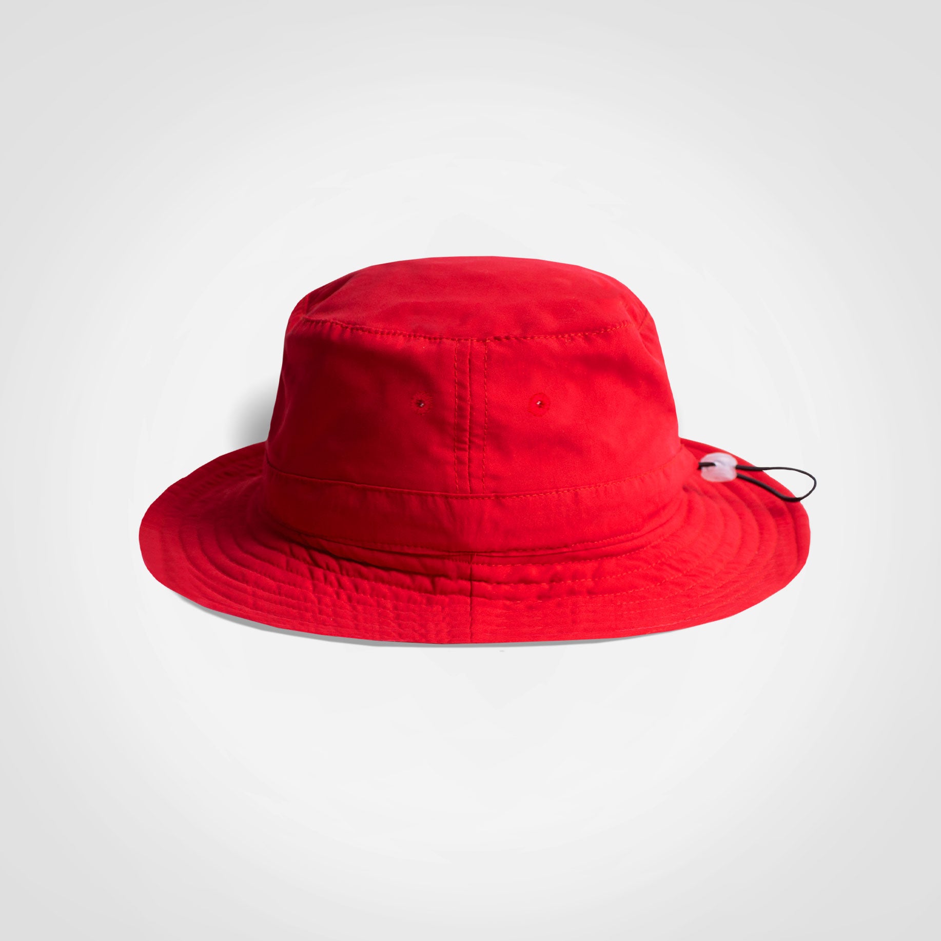 Red kids bucket hat with wide brim and stitched crown