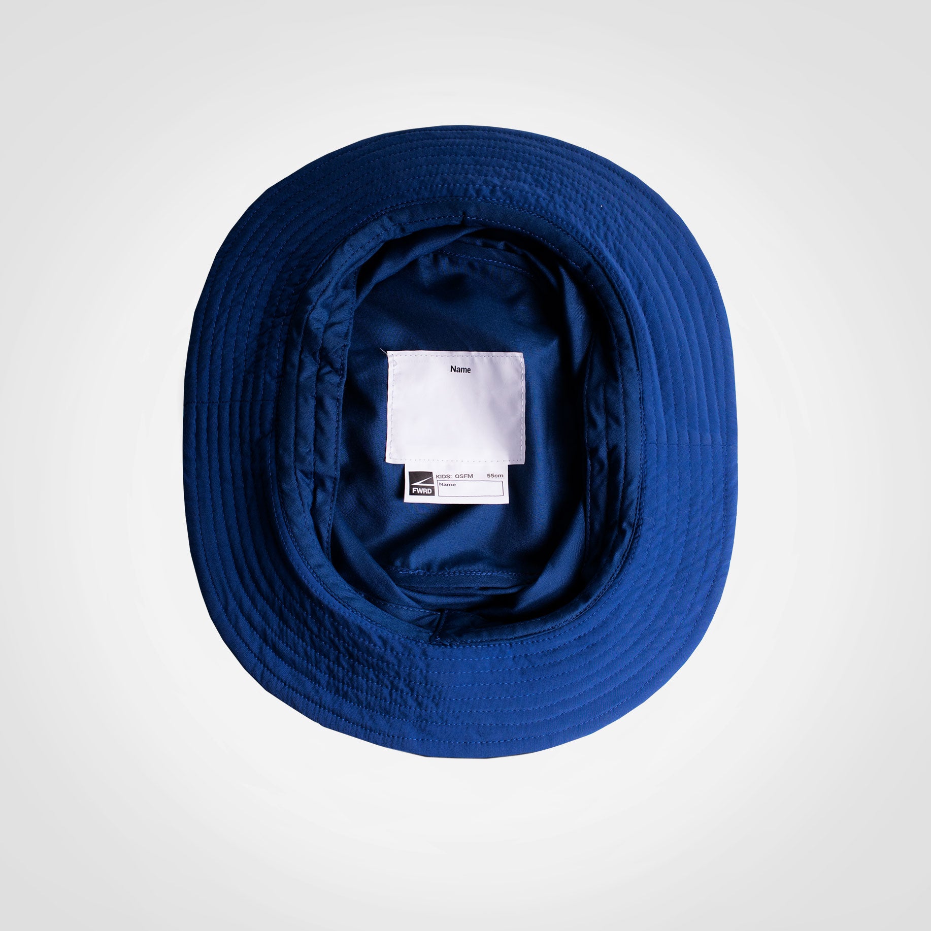 Navy kids bucket hat, interior view with fabric liner and size tag