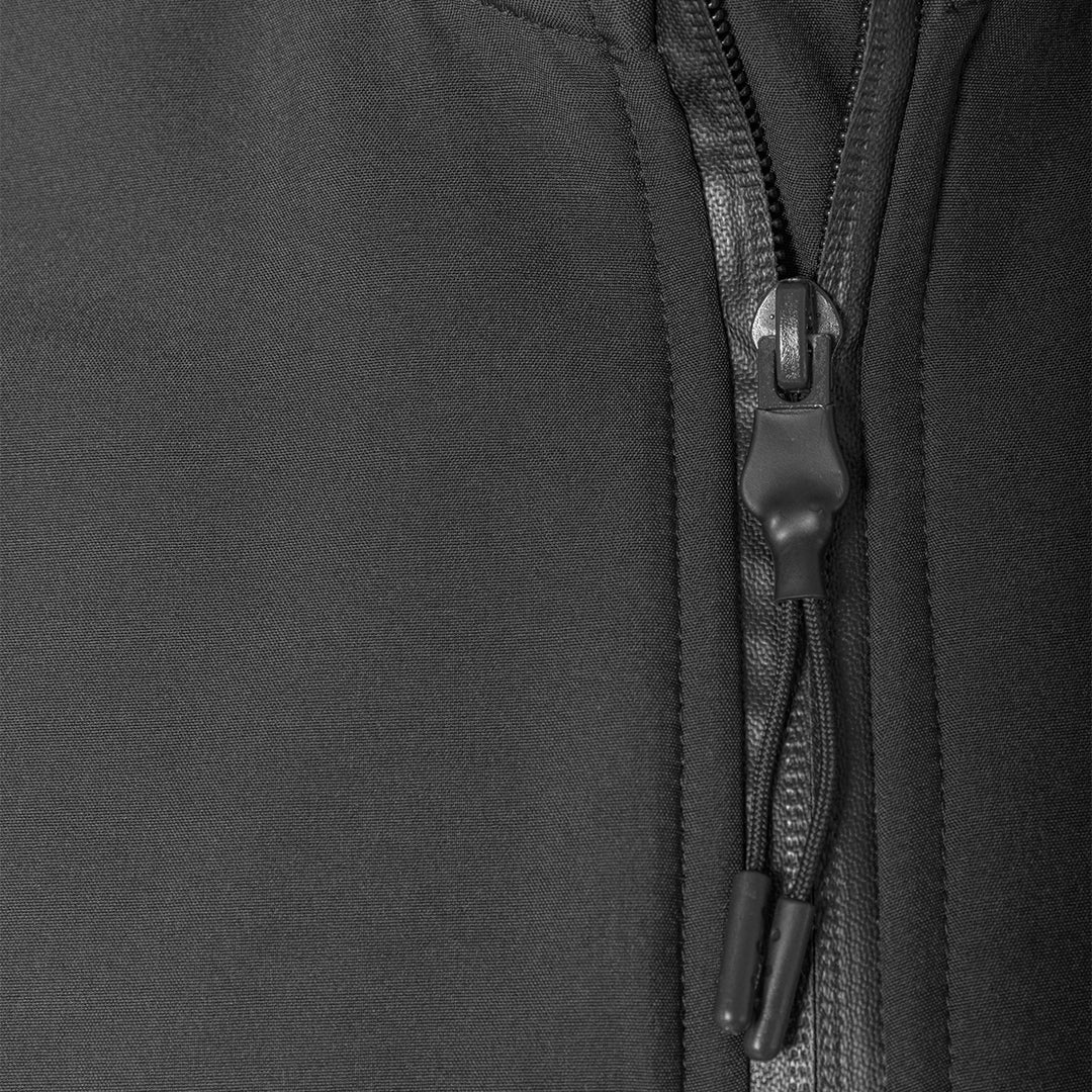 Black softshell jacket zipper close-up with pull tab